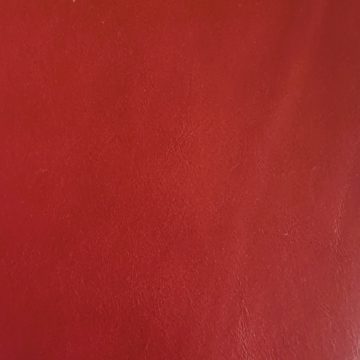 Biodegradable dyed through upholstery leather