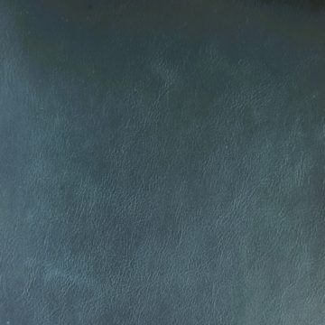 Biodegradable dyed through upholstery leather